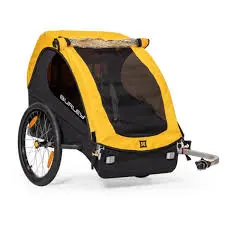 Yellow and black bike trailer with two wheels and mesh cover.